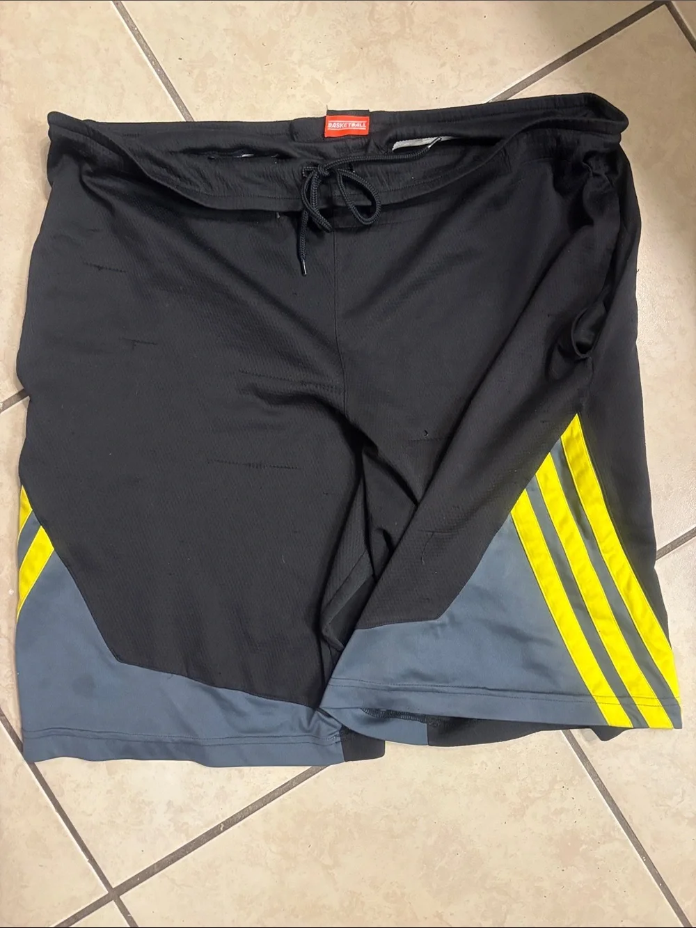 Adidas Black Athletic Shorts with Yellow Stripes
